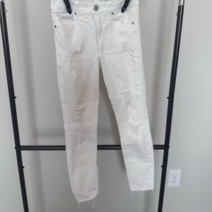 White stylish skinny jeans with rips